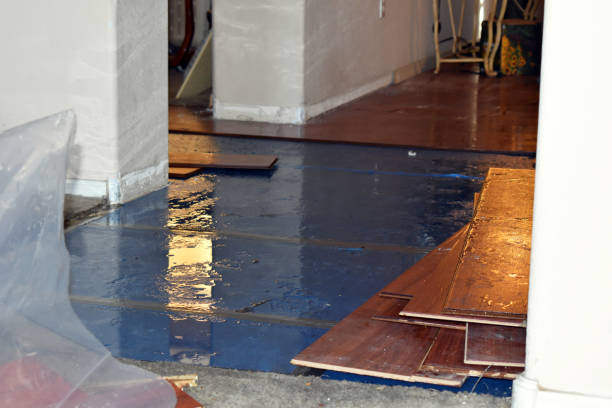 Professional Water Extraction technician working in Buchtel, OH